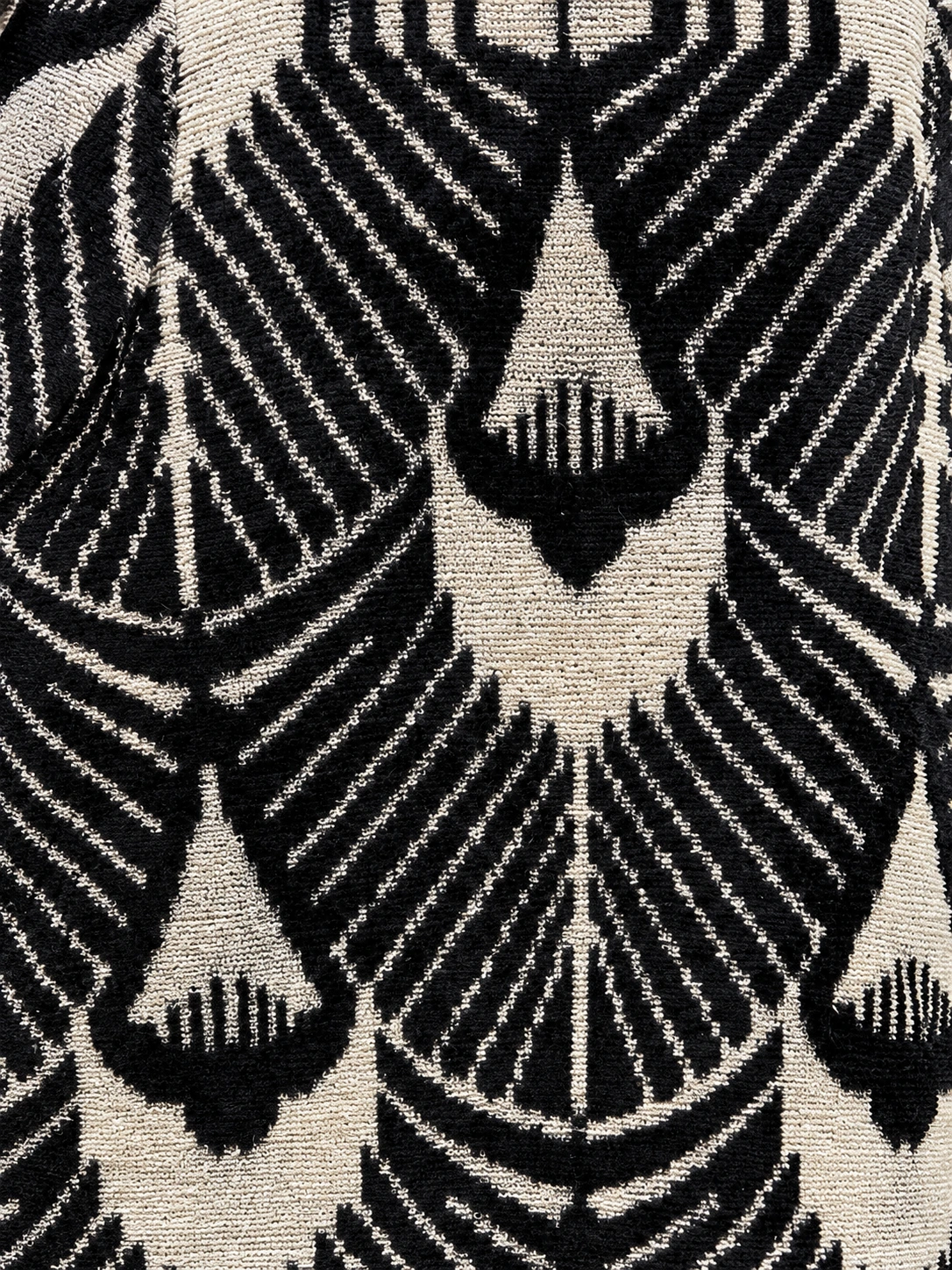 Handwoven Velvet Ikat Jacket — velvet texture and ikat pattern, lighting-adjusted from a source photograph